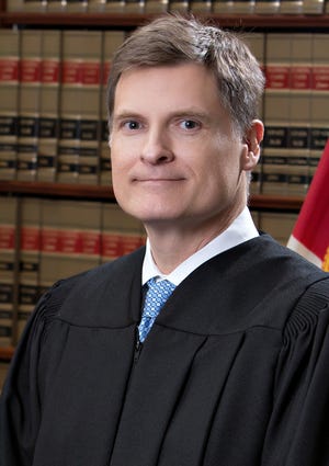 Florida Supreme Court Justice Carlos Muniz