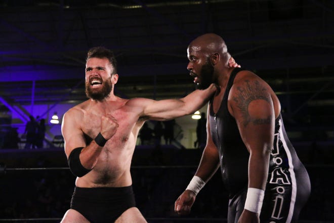 Tracy Williams prepares to deliver some offense to Shane Taylor during a match for Ring of Honor.