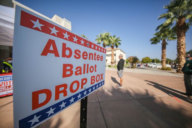 An absentee ballot drop box is placed in front of the Doña Ana County Government Center in Las Cruces on Tuesday, Oct. 6, 2020.