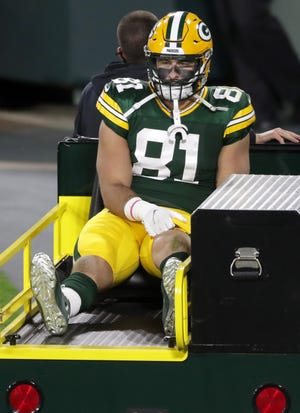 Green Bay Packers tight end Josiah Deguara (81) is carted off the field in the second half against the Atlanta Falcons on Monday, October 5, 2020, at Lambeau Field in Green Bay, Wis.