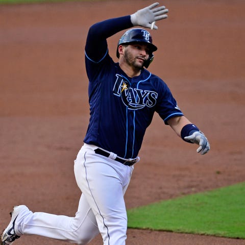 Rays catcher Mike Zunino rounds the bases after hi