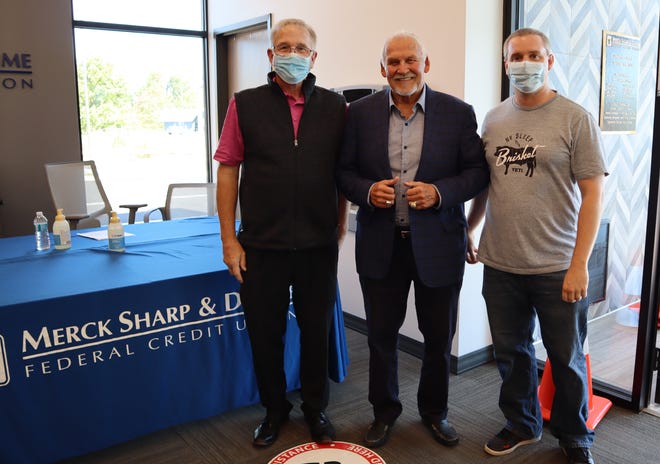 From left, Dave Whitehead, CEO of Merck Sharp & Dohme Federal Credit Union, MSDFCU; Bernie Parent, former Philadelphia Flyers goaltender and Hall of Famer; and Matt Whitehead. MSDFCU recently celebrated the grand opening of a new location at 274 North West End Boulevard, the credit union's seventh branch office in the financial institution's 70-year history.