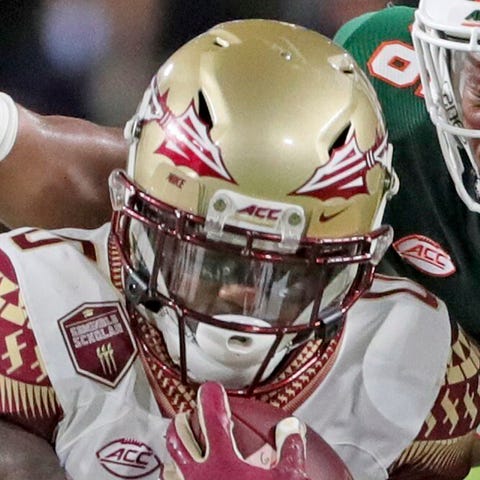 Florida State and Jashaun Corbin lost to Miami 52-