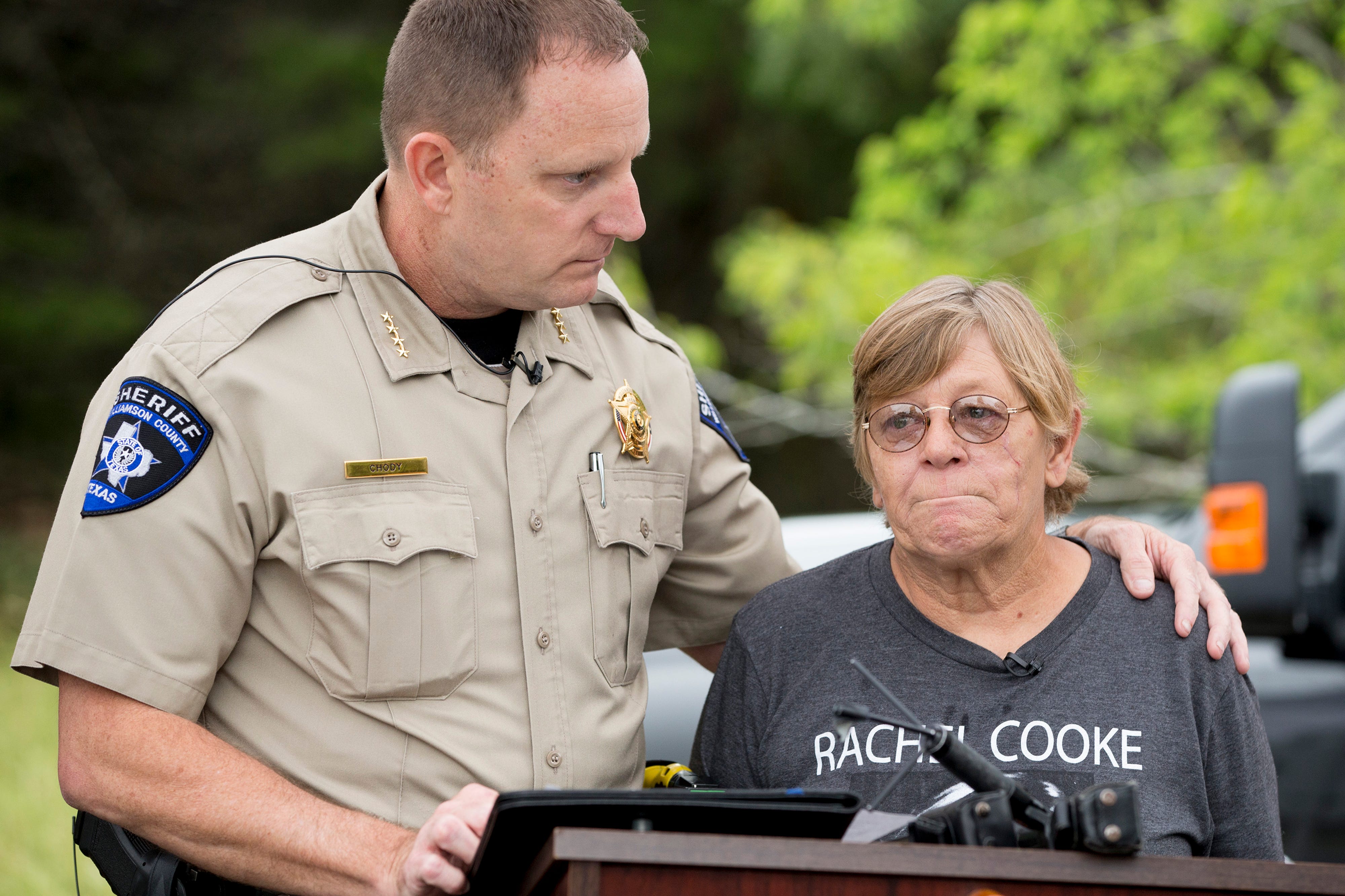 During a news conference in Sept. 2017, Williamson County Sheriff Robert Chody comforts Janet Cooke, the mother of Rachel Cooke, who went missing in 2002.