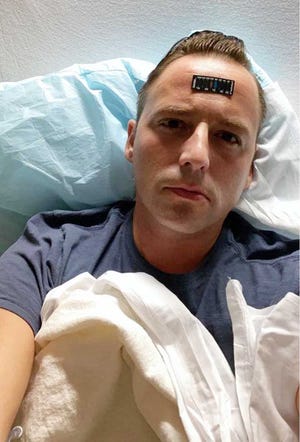 Aaron Williams shot this selfie while hospitalized last month at CarolinaEast Medical Center for COVID-19 and underlying medical conditions that nearly claimed his life.