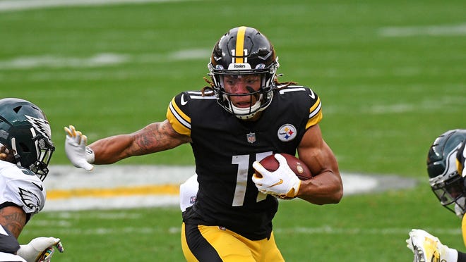 Pittsburgh Steelers wide receiver Chase Claypool (11) runs after a catch during the first half of an NFL football game against the Philadelphia Eagles in Pittsburgh, Sunday, Oct. 11, 2020. (AP Photo/Don Wright)