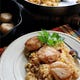 Seared scallops on top of corn and chorizo risotto is an easy and satisfying fall dish. (Gretchen McKay/Pittsburgh Post-Gazette/TNS)