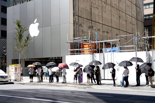 Standing on line outside an Apple Store in Tokyo