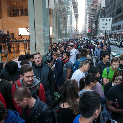 NEW YORK, NY - SEPTEMBER 22: Customers wait in lin