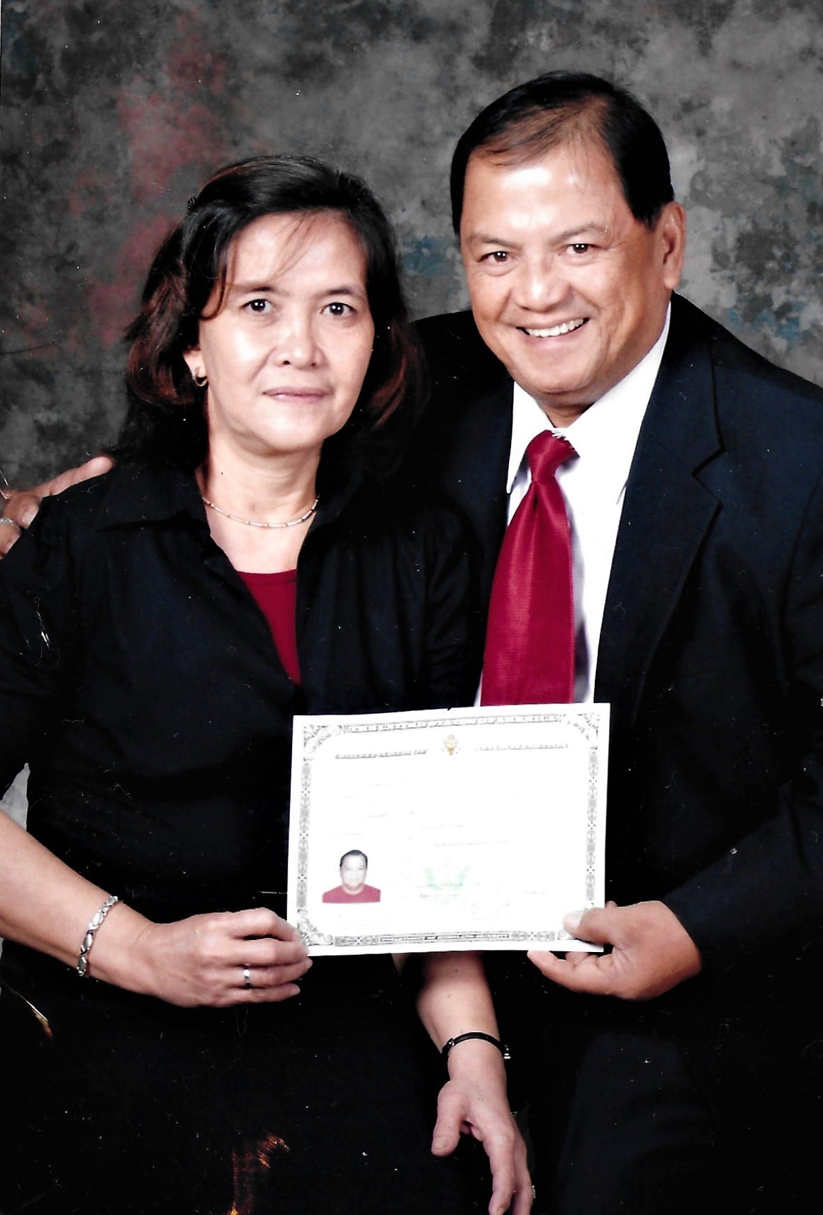 Delmario Cortez and his wife, Teresita Cortez, with his U.S. Certificate of Naturalization. Delmario Cortez was the 59th person on Guam to die from COVID-19.