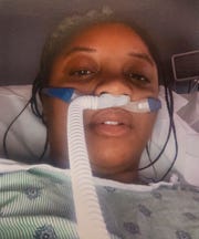 Unique Edwards is shown in the hospital being treated for COVD-19 earlier this year. Edwards, who was critically ill with COVID-19, credits her recovery to the antibodies in the plasma she received from former COVID patient Kris Klug.