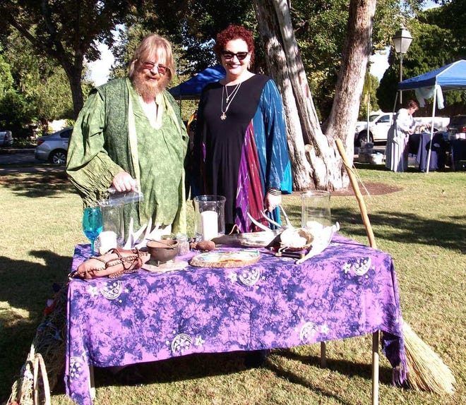Victor Gibbs and Lora Jackson Legare pose at a former Pagan Pride Day, where local practicing pagans meet and the public is invited to learn more about Wicca.