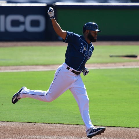 Manuel Margot rounds the bases after a three-run h