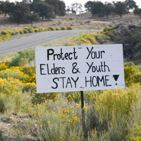  A sign on the Navajo Nation Indian Reservation wa