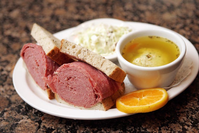 A TooJay's pastrami sandwich and matzo ball soup is served at the deli chain's now-closed Palm Beach Gardens location.