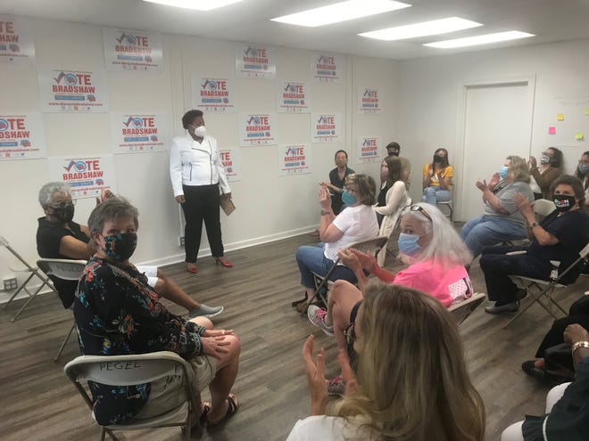 Supporters react to a point Marquita Bradshaw  makes during her speech at her Jackson office opening in Downtown Jackson on Monday, Oct. 12, 2020.