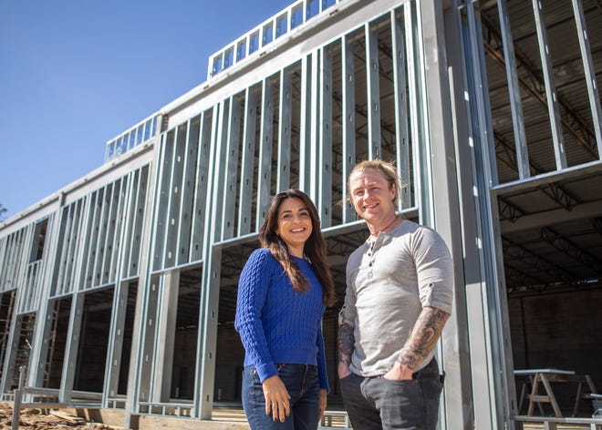 Greys Fine Cheese and Entertaining owners Jackie Mau and Kurt Mullican in front of the construction site of their cheese shop in Memphis, Tenn., on Wednesday, October 14, 2020. 