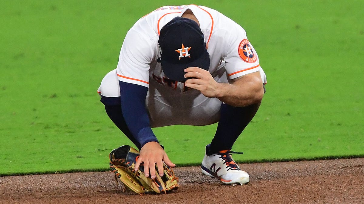 Jose Altuve reacts after making an error in the sixth.