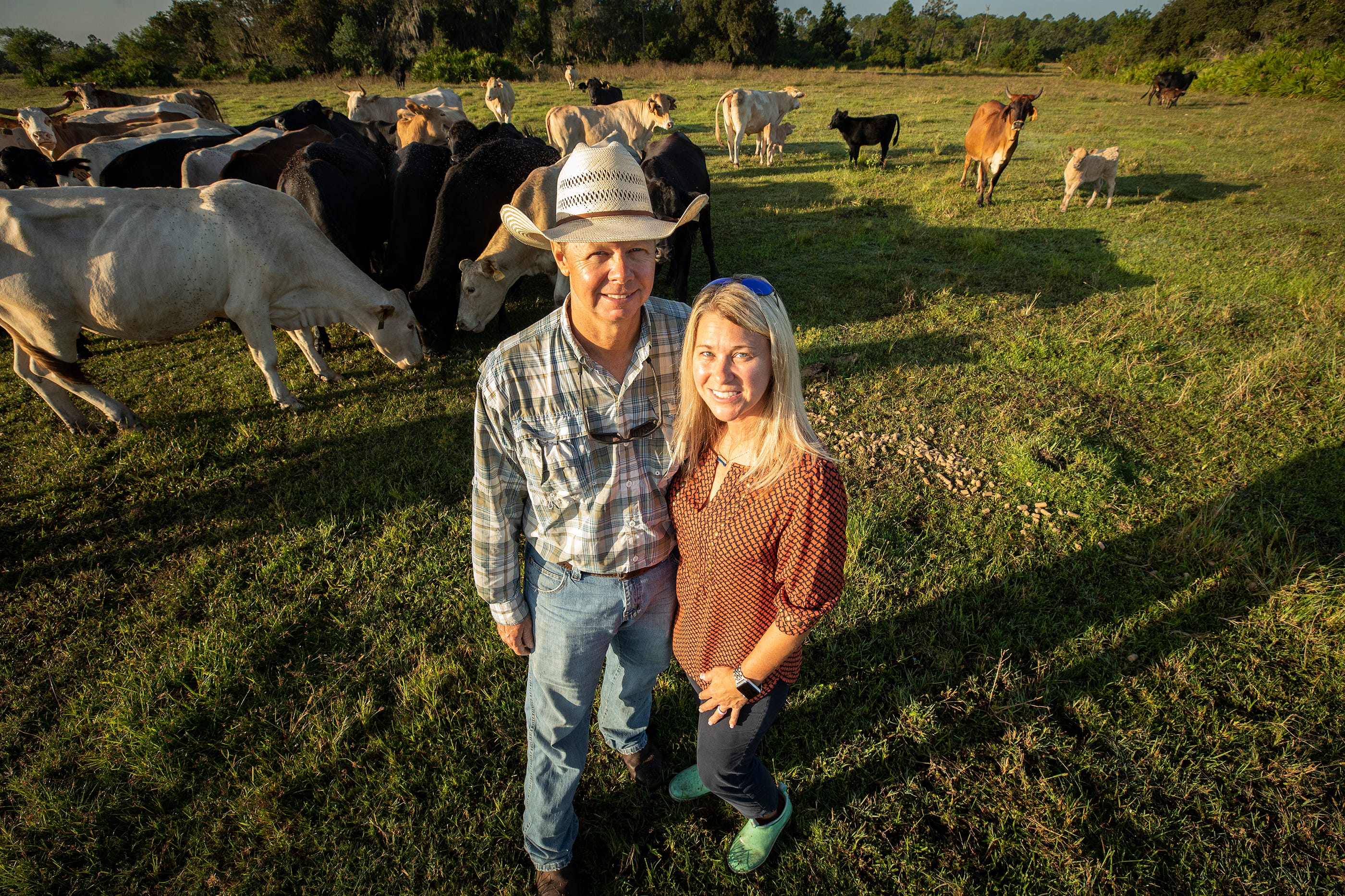 Fourth generation rancher Stuart Fitzgerald and his wife Stephanie are shown on their cattle ranch in Lake Wales. Cattle and beef prices remain low under pressure from foreign competition, keeping Polk ranches struggling.