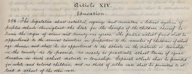Section 256 of Alabama's 1901 Constitution established a segregated school system: "Separate schools shall be provided for white and colored children, and no child of either race shall be permitted to attend a school of the other race."