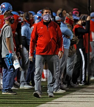 Monterey coach Wayne Hutchinson looks down the field during the game Thursday, Oct. 15, 2020, at PlainsCapital Park at Lowrey Field in Lubbock, Texas.