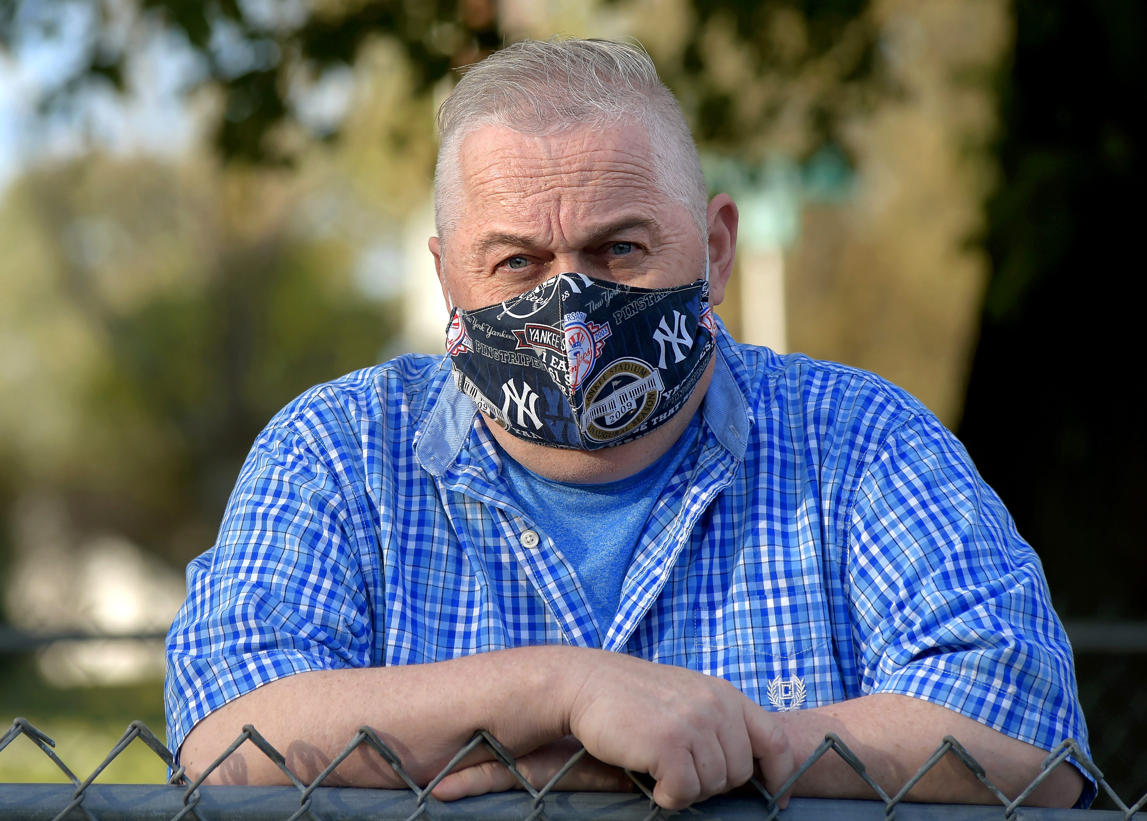 James Sova, a husband and father of two, in his Endicott backyard.