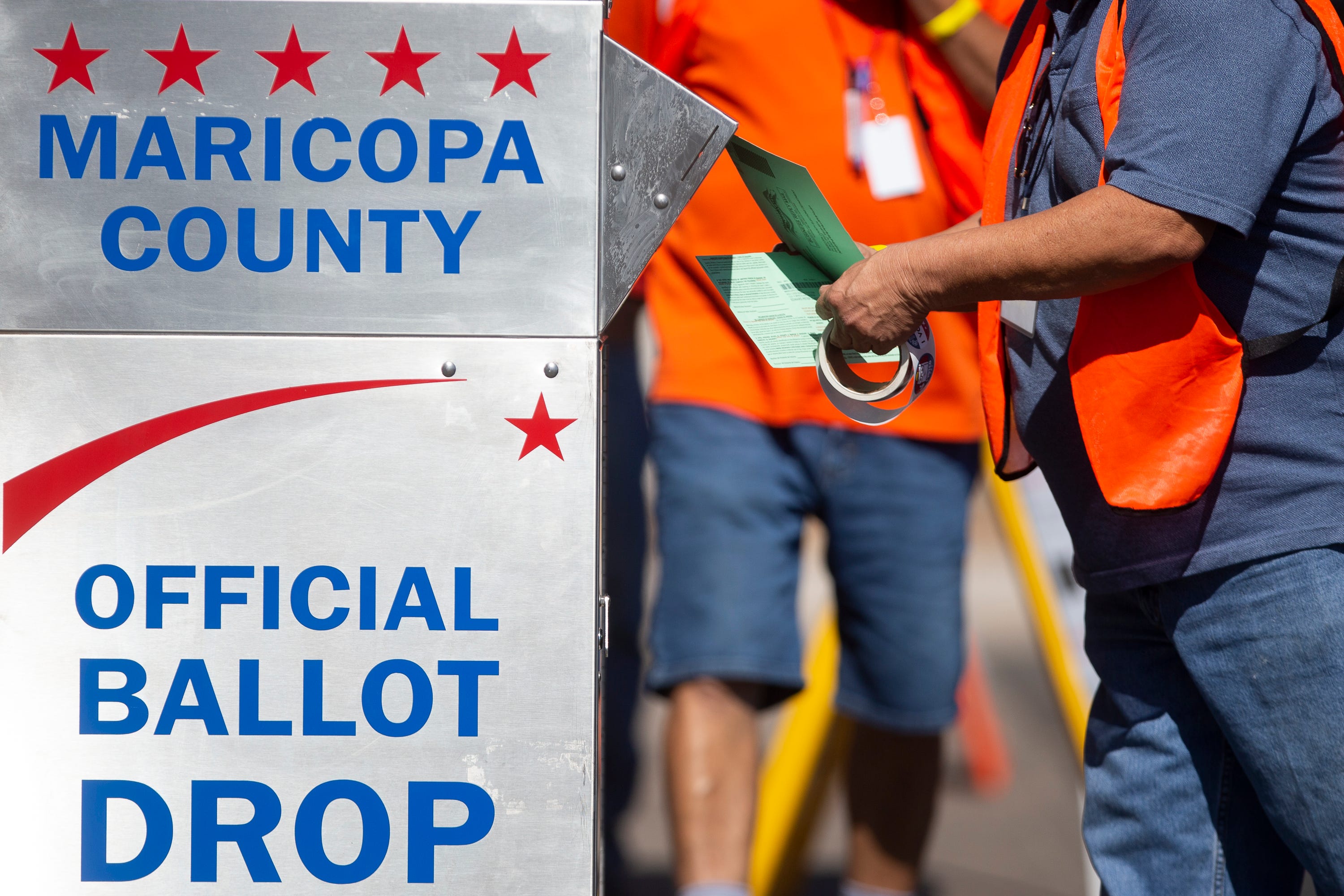 Arizona counts its mailed-in ballots first, and fewer Republicans sent in early ballots in 2020, instead dropping them off at the polls.