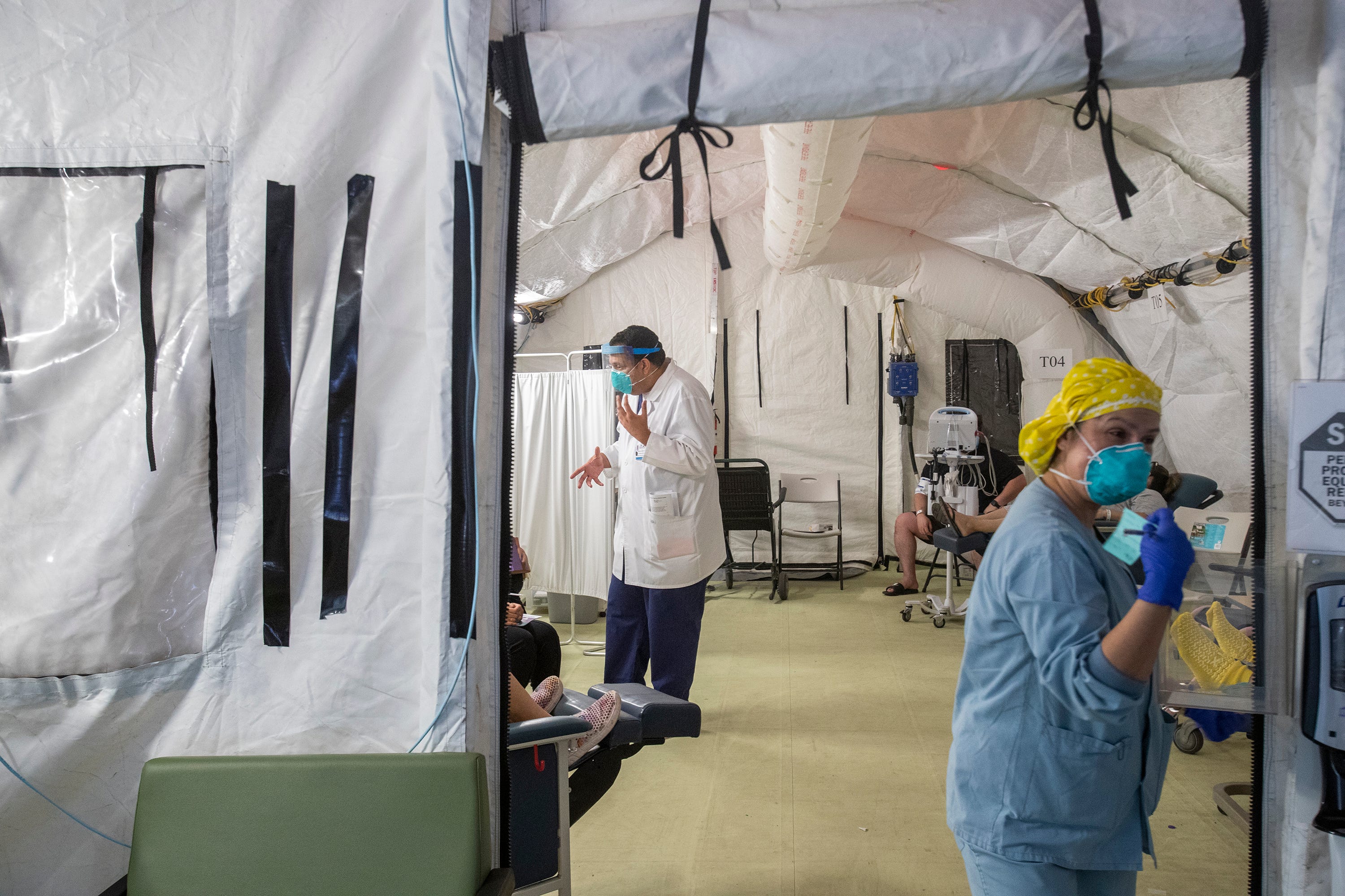 El Centro Regional Medical Center staff attend to suspected COVID-19 patients on May 30, 2020.