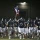 Casteel players rush out on to the field before their game with Queen Creek, Friday, Oct, 16, 2020.  #3643463001