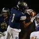 Casteel's Isaiah Newcombe hauls in a pass against the Queen Creek defense in the first half of their game in Queen Creek, Friday, Oct, 16, 2020.  #3643463001