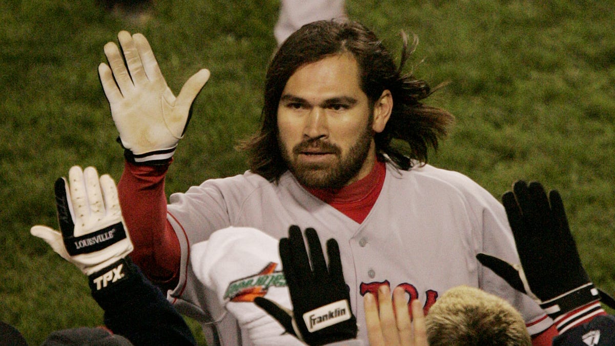 Boston's Johnny Damon celebrates his two-run home run against the New York Yankees in Game 7 of the American League Championship Series.