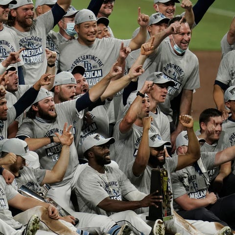 The Rays pose with the American League championshi