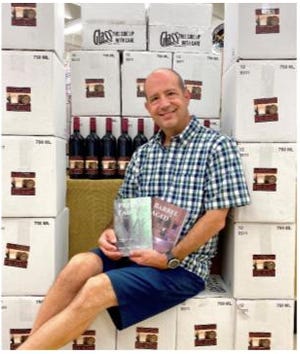 Businessman and owner of Gray Mart, Michael Gray, expresses his creative side by writing books and has a wine named after his mystery series.