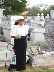 Etha Amling portrays Marianne Duchesne Dontao, wife of parish land owner and businessman Martin Donato, during the 18th annual St. Landry Church Cemetery tour, which concluded Sunday. During the event, groups are guided among the gravesites in the St. Landry Catholic Church cemetery where they were met by reenactors portraying former prominent residents who helped to shape St. Landry Parish history.