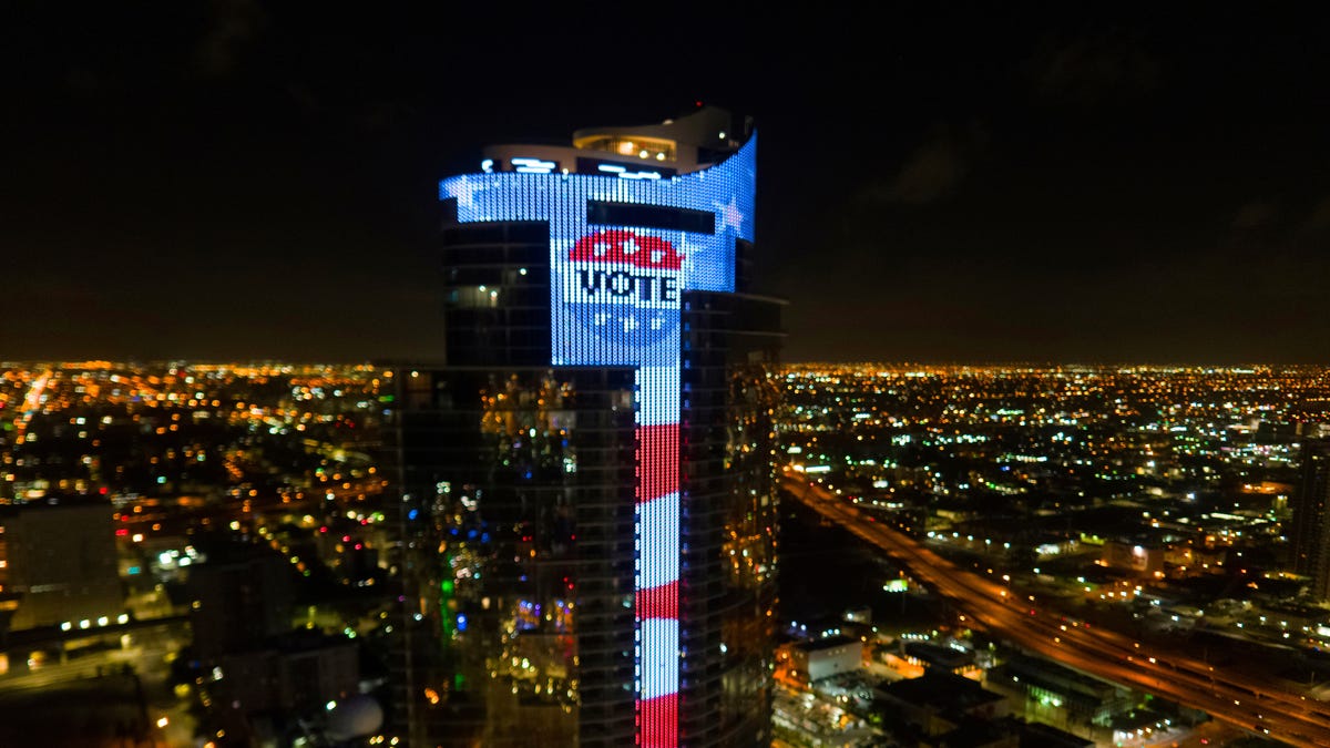 Florida's early voting is about to start, the Presidential campaigns continue in the Sunshine State and the futuristic Paramount Miami Worldcenter tower is lighting-up America's largest electronic U.S. flag and gigantic L.E.D. 