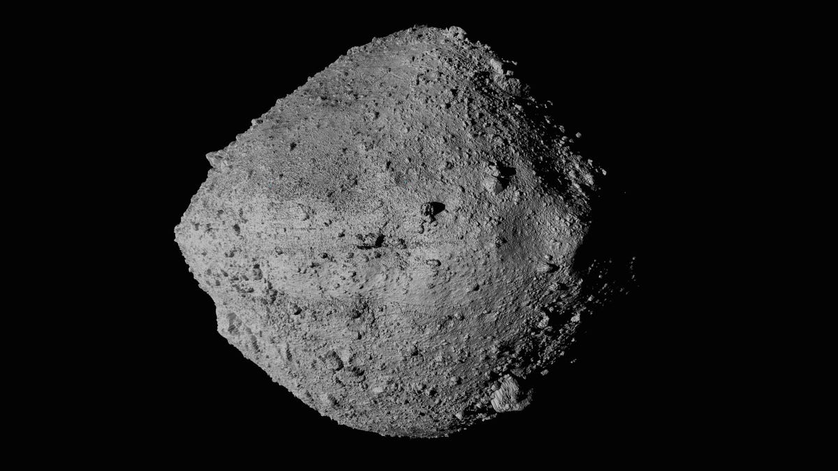 This undated image made available by NASA shows the asteroid Bennu from the OSIRIS-REx spacecraft. After almost two years circling the ancient asteroid, OSIRIS-REx will attempt to descend to the treacherous, boulder-packed surface and snatch a handful of rubble on Tuesday, Oct. 20, 2020.