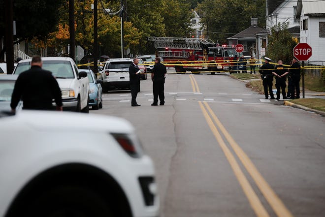 Emergency personnel are on the scene after a person was shot by at least one Elmwood Place police officer Tuesday afternoon, officials said.