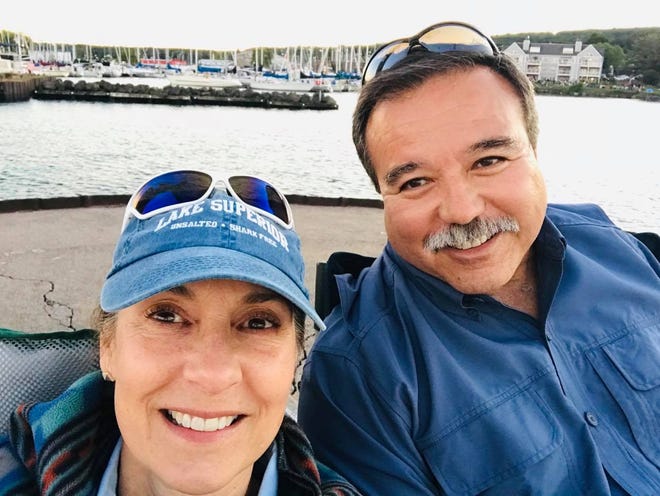 Lynn and Mike BeBeau, who found a little wooden boat on the shores of Lake Superior, 27 years after it was launched by teachers in Minnesota.