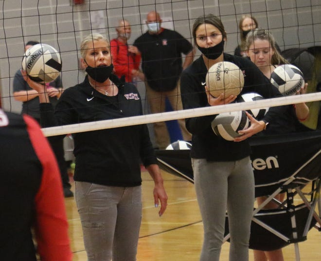 Crestview junior varsity coach Natalie Restille, right, and varsity coach Jody Ritchey, left, prepare for a tournament game against Colonel Crawford earlier in the season.