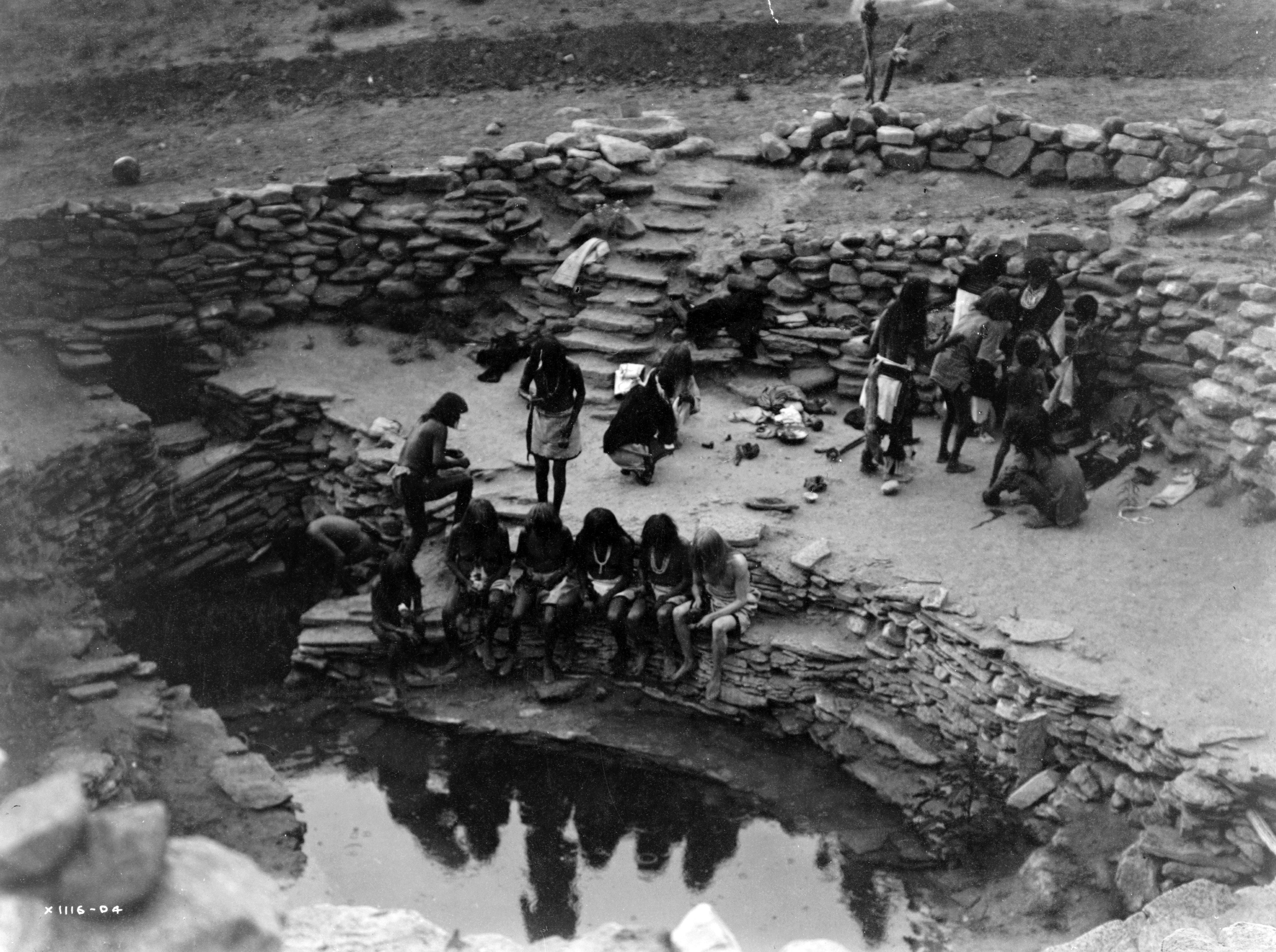 Hopi people gather for a flute ceremony at Toreva Spring in Mishongnovi on the Hopi Reservation in 1905.