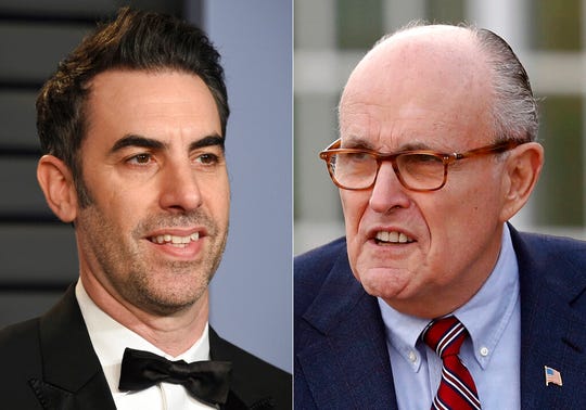 Sacha Baron Cohen arrives at the Vanity Fair Oscar Party in Beverly Hills, Calif., on March 4, 2018, left, and  former New York Mayor Rudy Giuliani at the Trump National Golf Club Bedminster clubhouse in Bedminster, N.J. on Nov. 20, 2016. Giuliani appears in a scene in the new "Borat" film. The scene, which was filmed in a New York hotel room in July, resulted in Giuliani calling police.