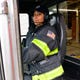 Brittani Rawls, a Passaic Firefighter, is the department's first female tillerman. Rawls not only steers the back of the truck, navigating tight city streets but also is the second firefighter in the building assisting the officer on site who is first in, to assess the situation and rescue people if need be.