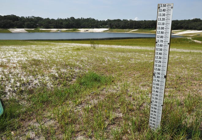 Water levels in Lake Brooklyn in Keystone Heights have been below historically normal levels for years. This photo of an old water gauge, on land that was once underwater, was taken in 2012 after a tropical storm had unloaded water on the area and raised lake levels, which remained far below levels when the gauge was installed.