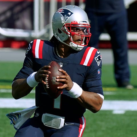 New England Patriots quarterback Cam Newton drops 