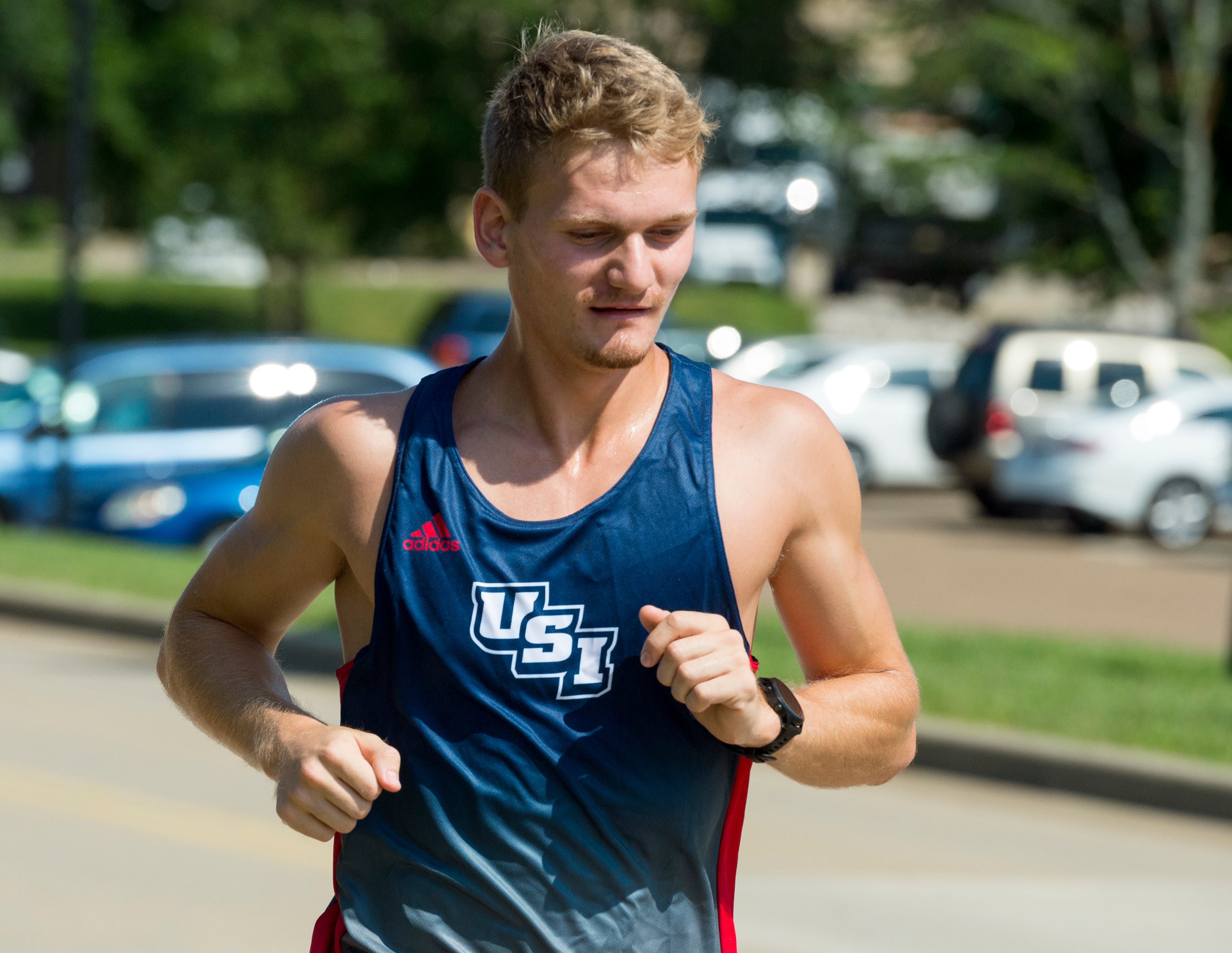 University of Southern Indiana runner Markus Poulsen runs his typical route around campus Tuesday, Sept. 8, 2020.