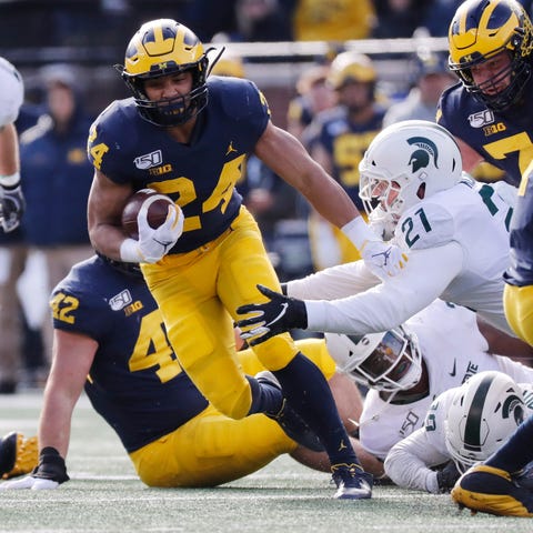 Michigan running back Zach Charbonnet carries the 