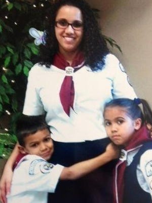Yessenia Suarez, 28, and her children, Thalia Otto, 9, and Michael Elijah Otto, 8.