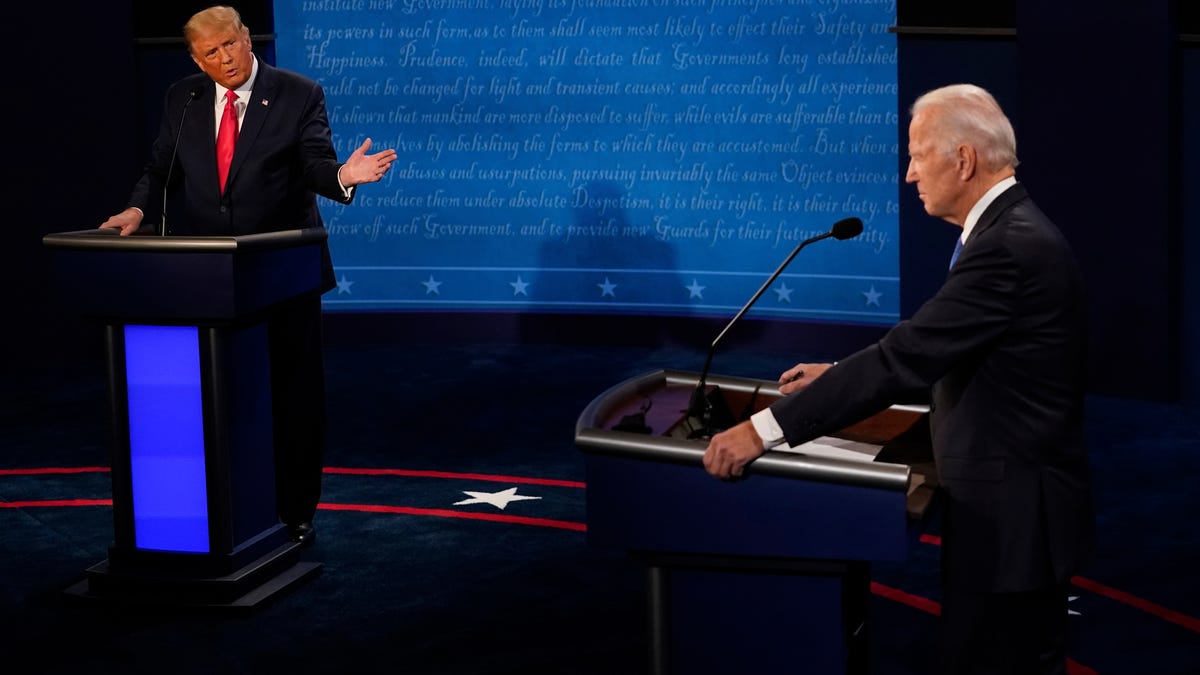 President Donald Trump gestures toward Democratic presidential candidate former Vice President Joe Biden.