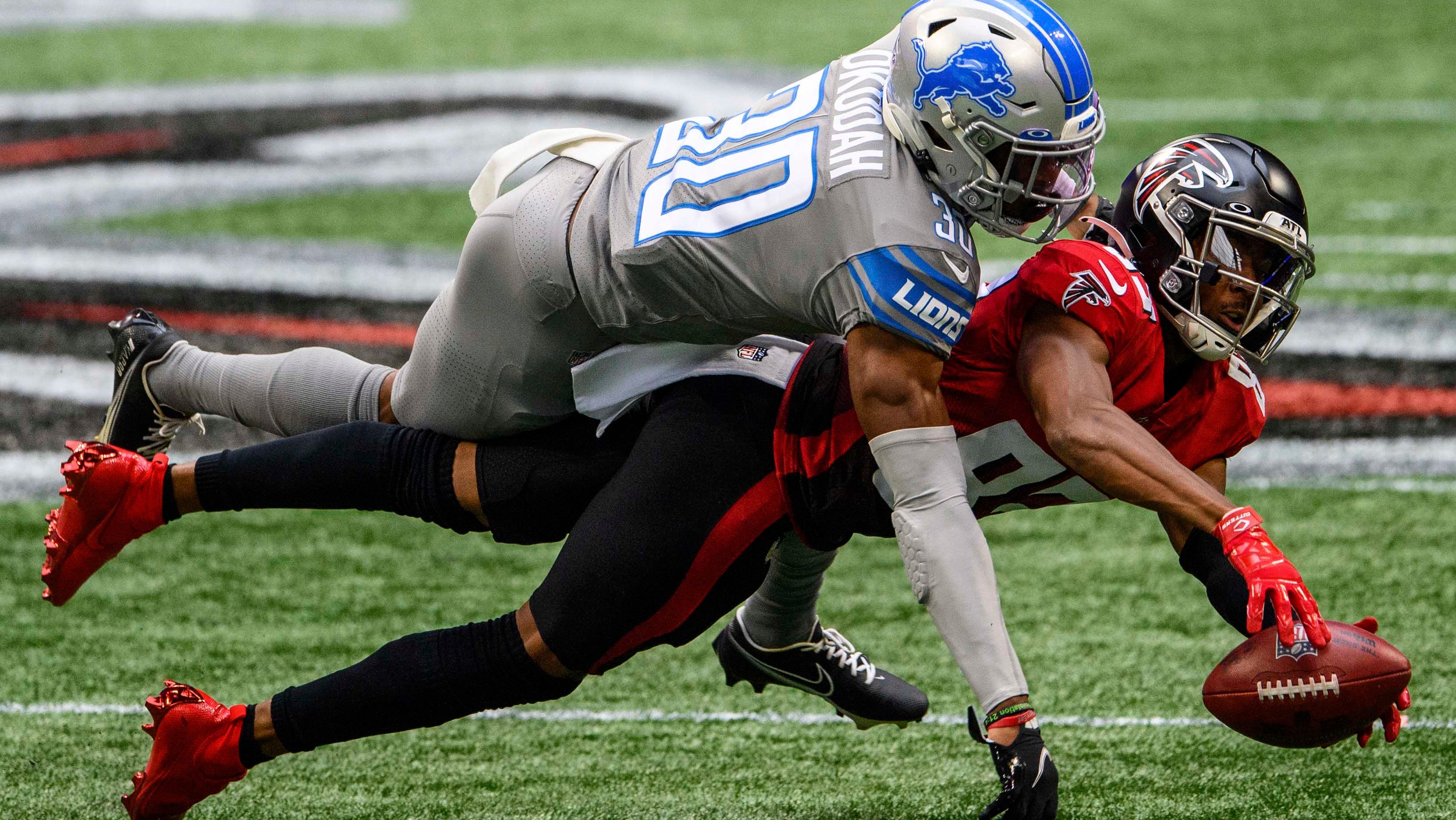 Atlanta Falcons wide receiver Russell Gage (83) can't make the catch as Detroit Lions cornerback Jeff Okudah defends.