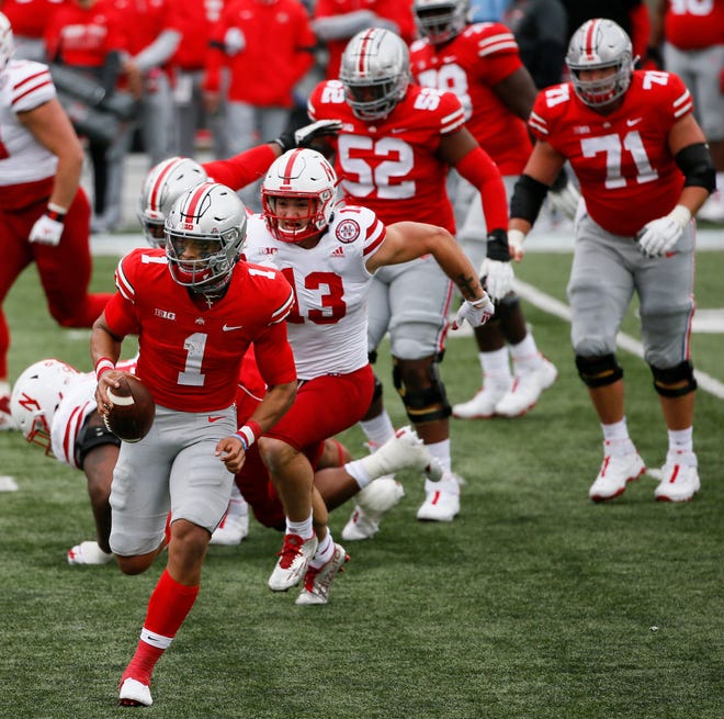 Ohio State quarterback can't find an open receiver, so he runs for a 17-yard touchdown in the third quarter of Ohio State's 52-17 win over Nebraska